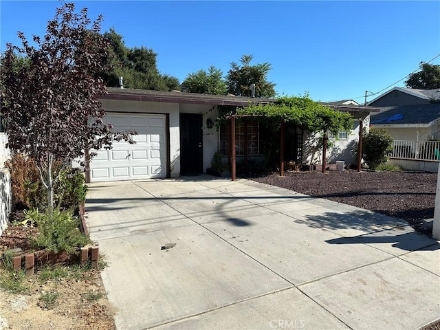 single story home with a garage