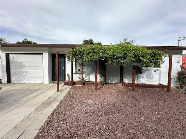 single story home featuring a garage