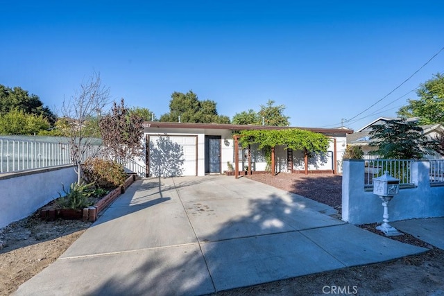 view of front of property featuring a garage