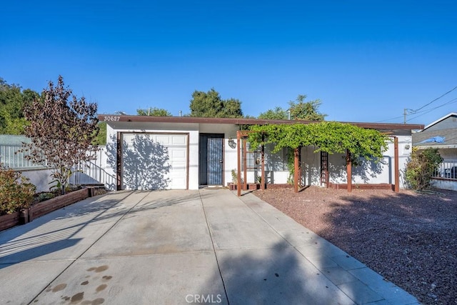 ranch-style home with a garage