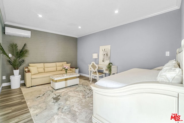 bedroom with a wall unit AC, crown molding, and light hardwood / wood-style flooring