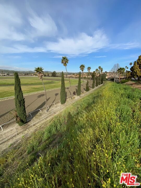 view of yard with a rural view