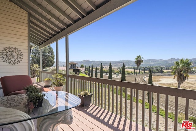 deck with a mountain view