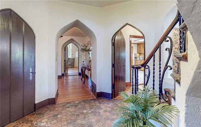 hallway featuring dark hardwood / wood-style floors