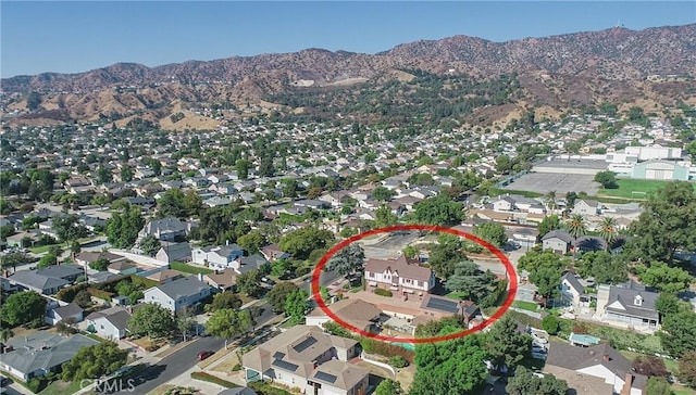 bird's eye view featuring a mountain view