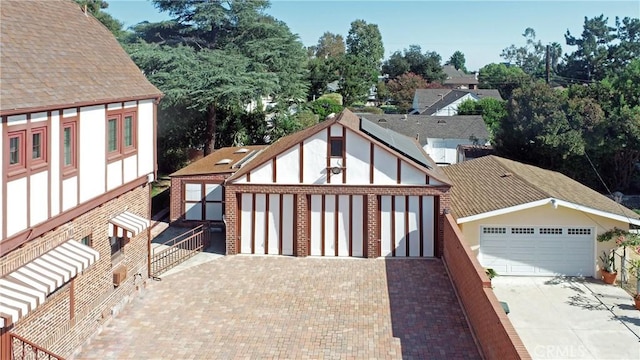 exterior space with a garage