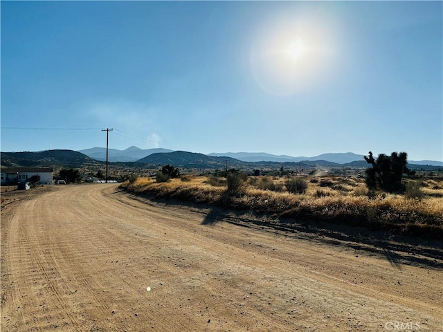 view of mountain feature with a rural view