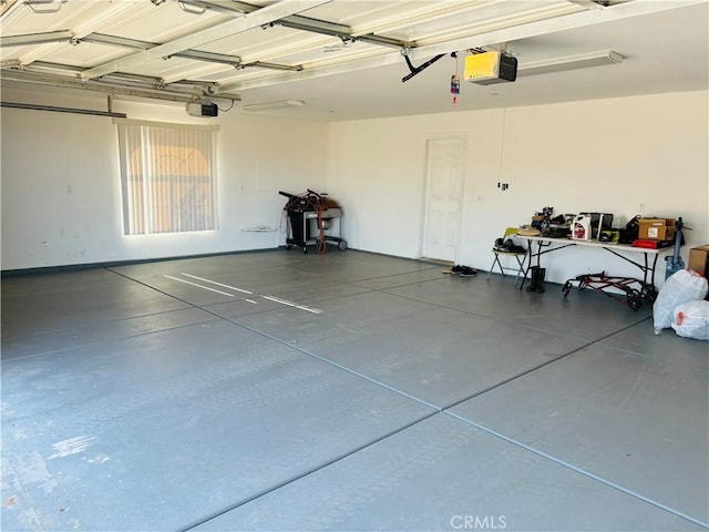 garage featuring a garage door opener