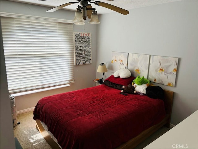 bedroom featuring carpet floors and ceiling fan