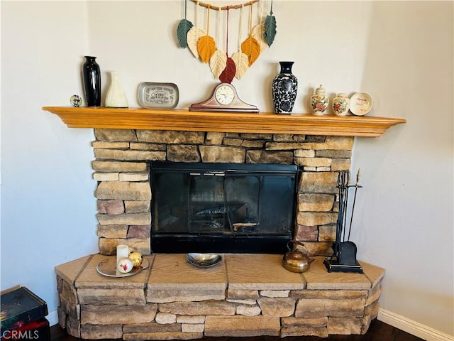 details with a fireplace and hardwood / wood-style floors