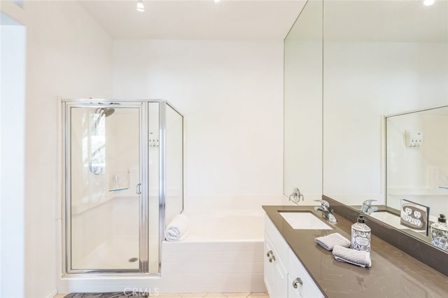 bathroom with vanity and plus walk in shower