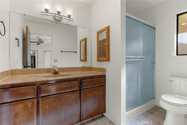 6131 Dana Cir, Magalia, CA 95954 - bathroom with toilet, vanity, a stall shower, a ceiling fan, and tile patterned floors