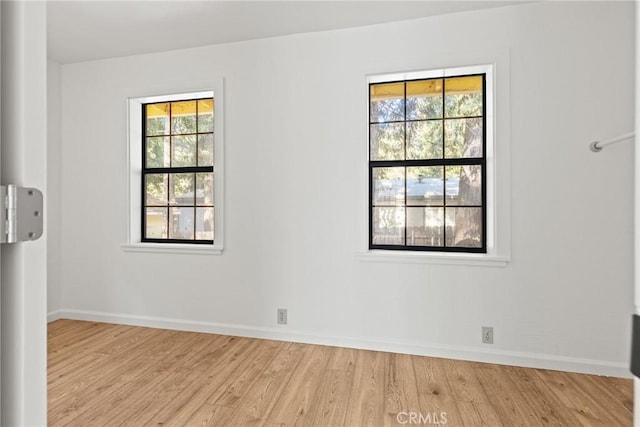 6131 Dana Cir, Magalia, CA 95954 - spare room featuring wood finished floors, healthy amount of natural light, and baseboards