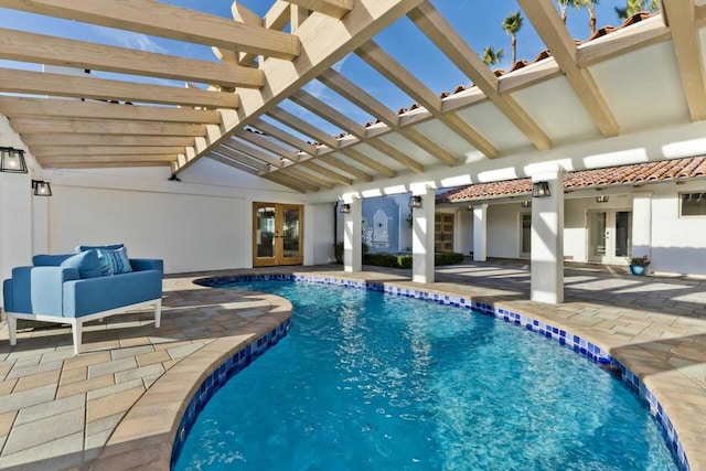 view of swimming pool with french doors, a pergola, and a patio