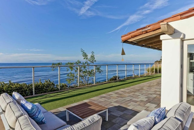 view of patio featuring a water view and an outdoor hangout area