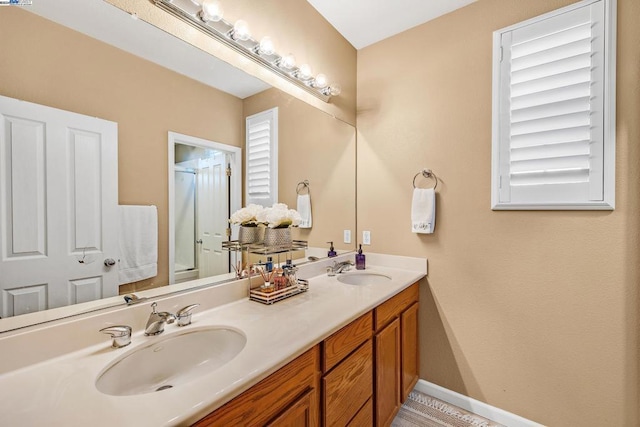 bathroom with a wealth of natural light and vanity