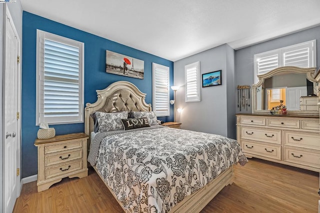 bedroom featuring hardwood / wood-style flooring