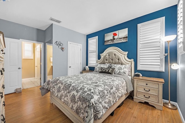 bedroom featuring light hardwood / wood-style flooring