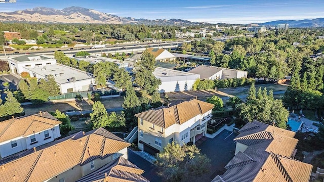 birds eye view of property featuring a mountain view