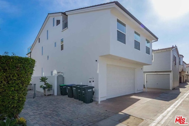 exterior space with a garage