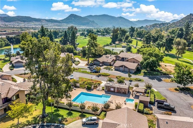 drone / aerial view featuring a mountain view