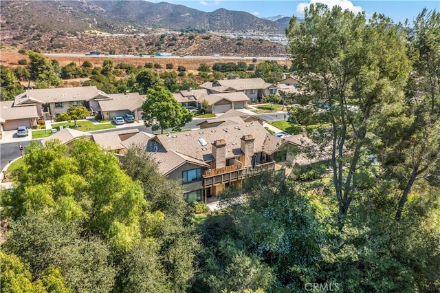 bird's eye view with a mountain view