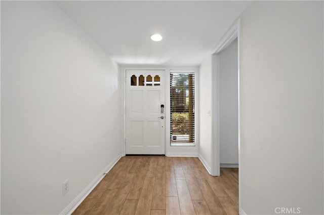 foyer entrance featuring light wood-type flooring