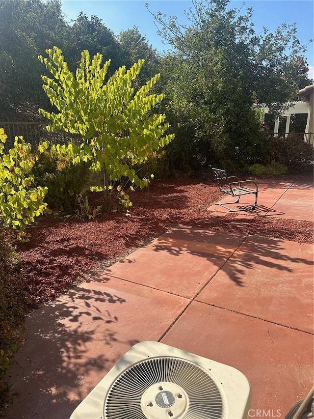 view of patio with central AC unit