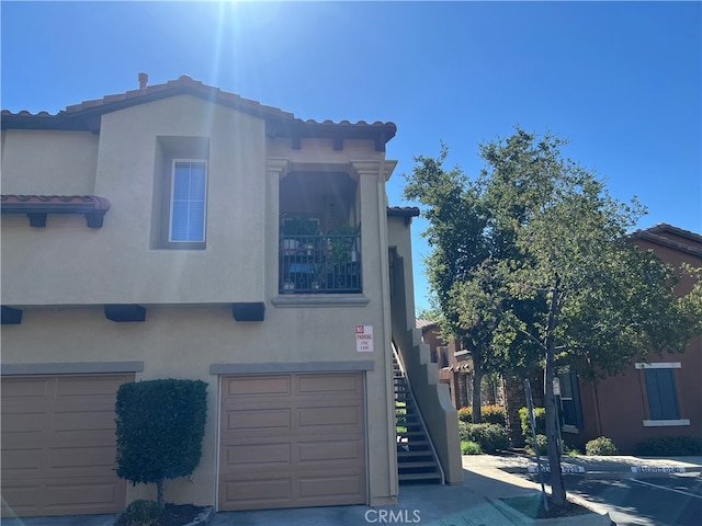 view of front of property with a garage