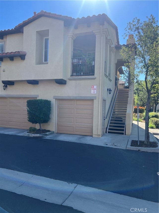 view of front of home with a garage