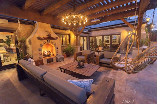 view of patio / terrace featuring an outdoor living space with a fireplace