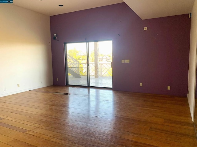 spare room featuring light hardwood / wood-style floors