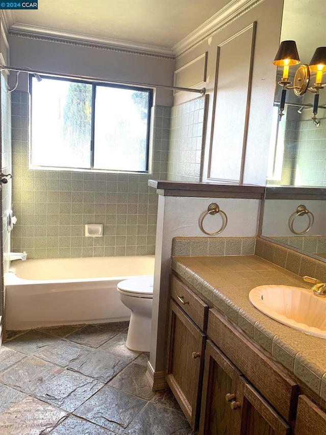 full bathroom with shower / tub combination, vanity, toilet, and crown molding