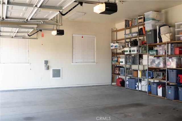 garage featuring a garage door opener