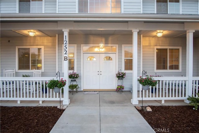 property entrance with a porch