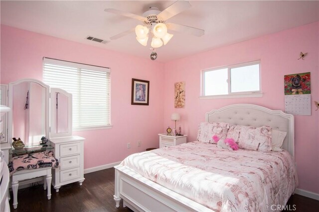 bedroom featuring dark wood-type flooring and ceiling fan