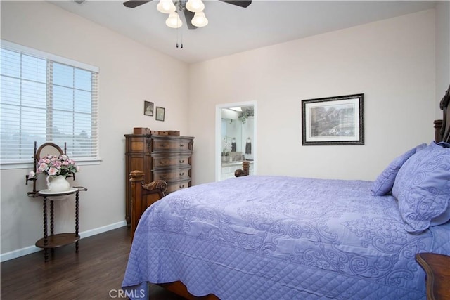 bedroom with dark hardwood / wood-style flooring, ceiling fan, and ensuite bath