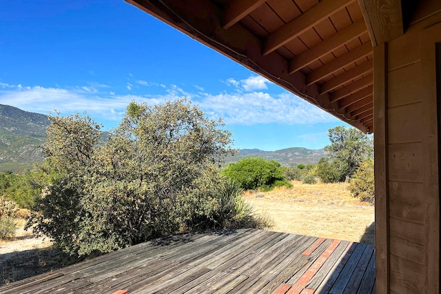 wooden terrace with a mountain view