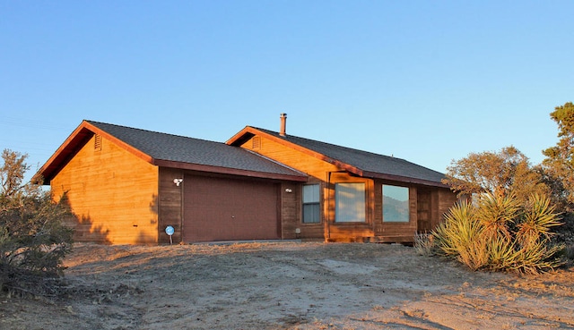 exterior space featuring a garage