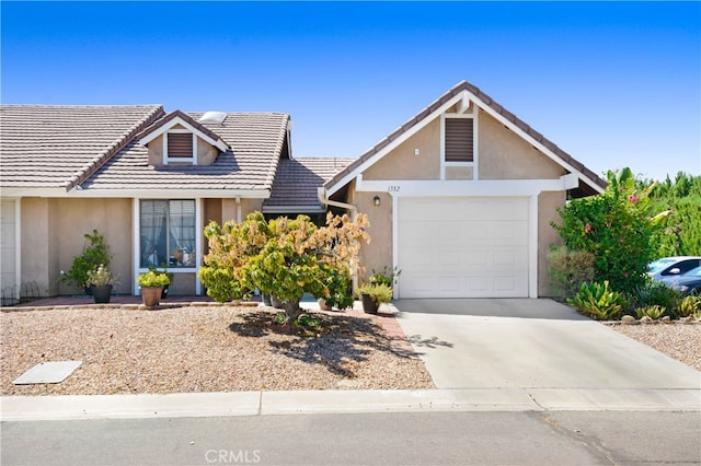 single story home featuring a garage