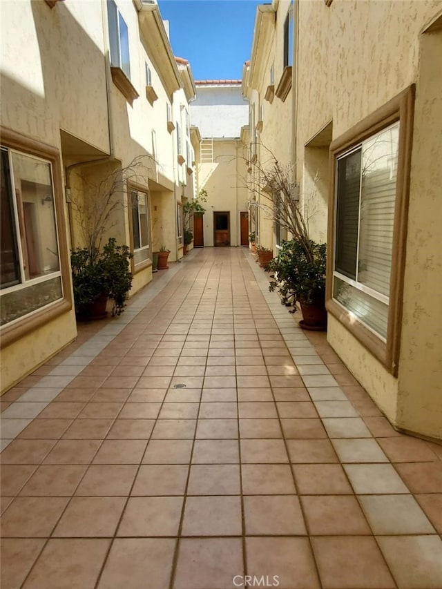 view of property's community with a patio