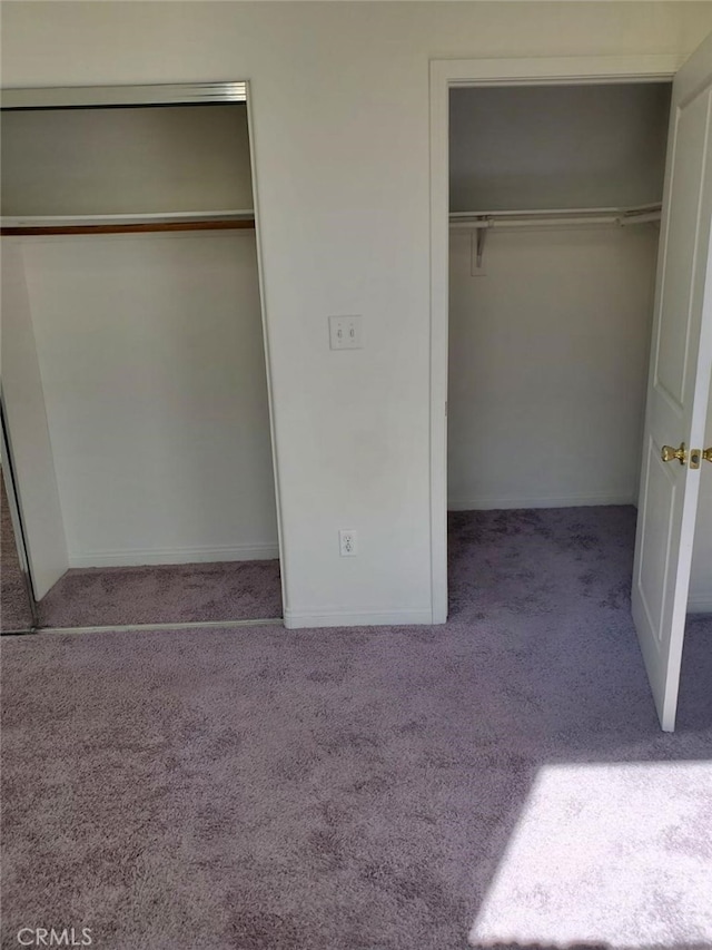 unfurnished bedroom featuring carpet flooring