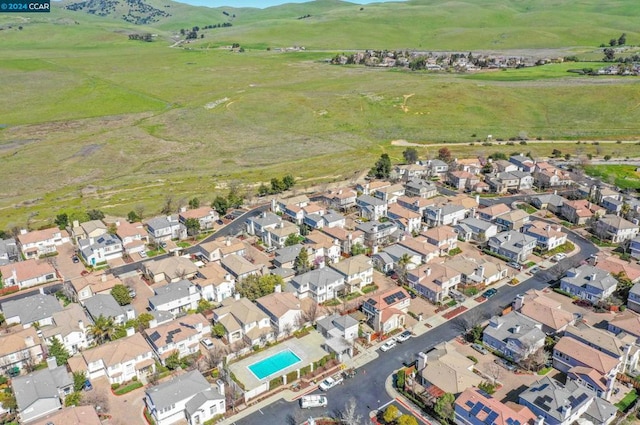 birds eye view of property with a rural view