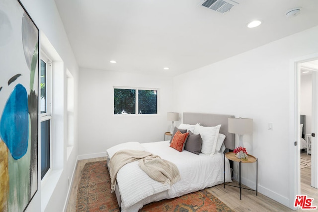 bedroom featuring light wood-type flooring