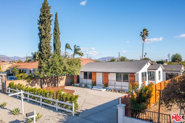 view of front of house with a mountain view