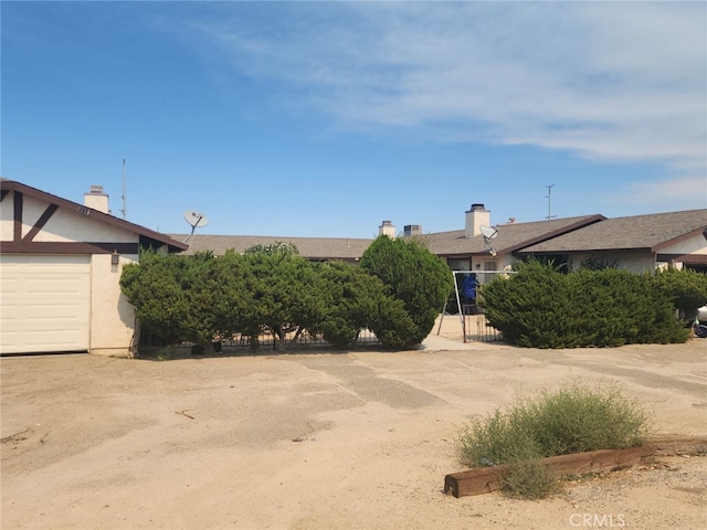 view of yard with a garage