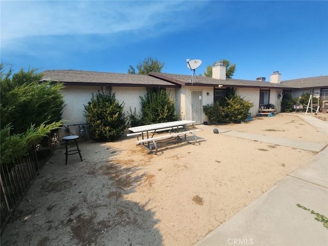 view of front of home featuring a patio