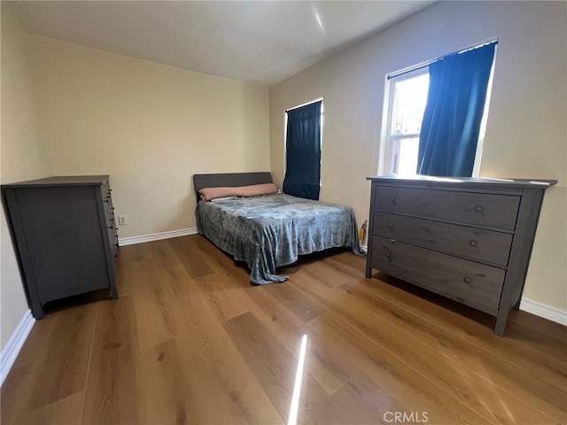 bedroom featuring light hardwood / wood-style floors