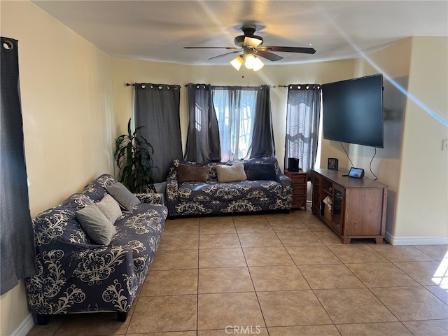 living room with tile patterned floors and ceiling fan