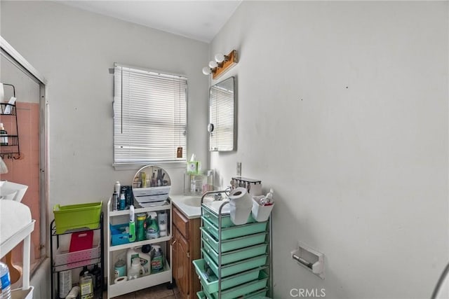 bathroom featuring tile patterned flooring and sink